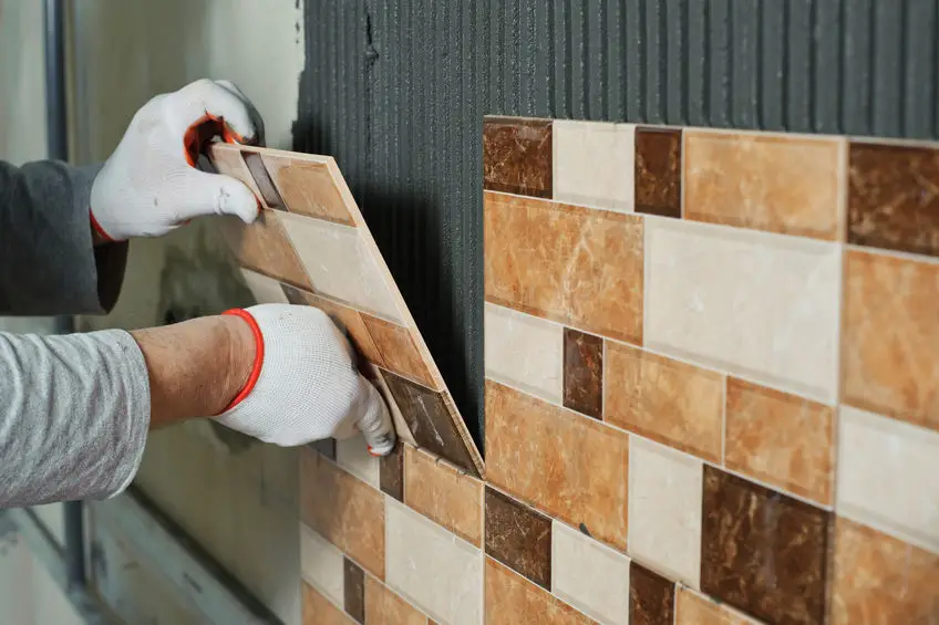 can you tile over wall tiles in a bathroom